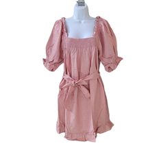 Nwt Eloquii Blush Linen Blend Smocked Front Mini Dress. Size 14/16. Front Panel Smocked Detail. A-Line. Elasticized Ruffle At Shoulder. Ruffle Hem. Self Waist Tie Belt. 55% Linen 45% Viscose. Machine Wash Cold Gentle Cycle. Approx. Measurements: 18" Armpit To Armpit Flat Unstretched. 35" Length. Plus Size Sweater Dress, Denim Chambray Dress, Eloquii Dress, Green Velvet Dress, Silk Wrap Dresses, Cherry Dress, Floral Sheath Dress, Short Sleeve Mini Dress, Plus Size Sweaters