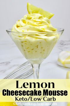 lemon cheesecake mousse in a glass bowl on a marble counter top with text overlay that reads, lemon cheesecake mousse low carb