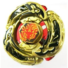 a close up of a gold ring with red and black decorations on the front, against a white background