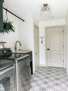 a washer and dryer in a small room