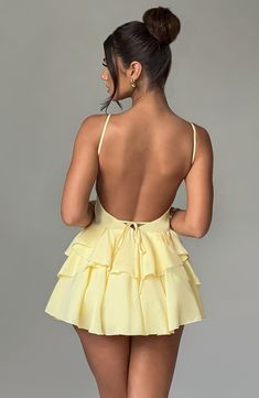 Wear this pretty playsuit on repeat, cut from our premium chiffon which is super floaty and lightweight. Featuring a layered ruffle skirt with built in shorts, this plunge neck design is backless with adjustable straps for your perfect fit. Partner with barely there heeled sandals and a bright bag. 



Colour: Lemon.

Premium non-stretch chiffon.

Fully lined.

Layered ruffle skirt with built in shorts.

Plunge neckline.

Adjustable straps.

Internal tie at waist.

Backless design.

Invisible zi Backless Slip Dress, Layered Ruffle Skirt, Elegant Mini Dress, Looks Party, Maxi Dress Sale, Backless Mini Dress, Sparkle Dress, Backless Design, Mini Dresses For Women