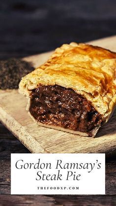 gordon ramsay's steak pie on a cutting board with the words gordon ramsay's steak