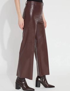 The Hi Waist Vegan Leather Wide Leg pant is fitted at the waist and hip before falling into a wide, ankle-length leg. Made from 4-way stretch Textured Vegan Leather, these wide-legged pants feature a concealed patented waistband, beltloops, patch pockets and no side seam for a slimming look. A raw-edge hem makes them simple to shorten. Partner these faux leather wide-leg pants with a tucked funnel neck top and zip up ankle boots. Vegan Leather- 100% Polyurethane Lyssé concealed patented 360 smoo Faux Leather Wide Leg Pants, Leather Wide Leg Pants, Sorel Sandals, Sneaker Slippers, Sale Store, Deep Burgundy, Karen Kane, Wide Leg Pant, Heels & Wedges