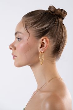 Introducing our exquisite collection of minimalist huggie hoop gold earrings, designed specifically for those who appreciate the allure of understated elegance. Crafted with utmost precision and a touch of sophistication, these earrings are an absolute must-have for any style-conscious individual. With a timeless design that effortlessly blends minimalism with modern aesthetics, these huggie hoop earrings are the perfect accessory to elevate any outfit. The sleek golden hoops hug your earlobe ge Golden Hoops, Contemporary Accessories, Hoop Design, Birthstone Gifts, Huggie Hoop Earrings, Sleek Look, Gold Charm, Gold Hoop Earrings, Diamond Gemstone