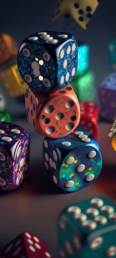 colorful dices are scattered around on a table