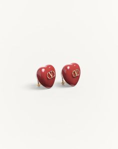 Coeur Royal Earrings in Metal and Enamel - Gold-tone finish - Enamel domed hearts with VLogo Signature detail in metal - Size: 2.5 x 2.5 cm / 1.0 x 1.0 in. - VLogo size: 12x7 mm / 0.47x0.28 in. - Clip closure - Made in Italy Luxury Enamel Earrings For Anniversary, Luxury Pierced Earrings For Valentine's Day, Elegant Heart-shaped Enamel Earrings, Valentine's Day Polished Finish Earrings, Luxury Valentine's Day Earrings For Pierced Ears, Designer Heart-shaped Formal Earrings, Designer Heart-shaped Earrings As Gift, Designer Heart Shaped Earrings For Gift, Designer Heart-shaped Earrings For Gift