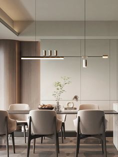 a dining room table and chairs in front of a wall with hanging lights above it