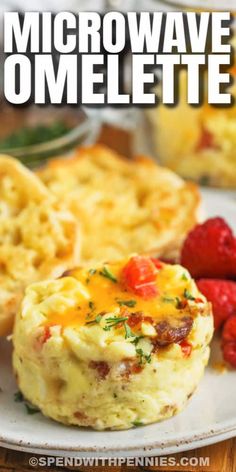 an egg muffin on a plate with strawberries and raspberries in the background