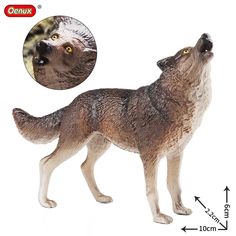 a wolf figurine is shown with measurements