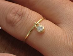 Features

- Made to order.
- Materials: 925 Sterling Silver
- Custom Gold Color: Yellow Gold, White Gold, and Rose Gold Plating
- Gemstone: Moissanite
- Number of Stone: 1
- Stone Size: 2.5mm
- CTW: 0.06
- Color: D
- Setting Type: Bezel Set
- SKU : R233-MO Stacking Rings, Bezel Setting, Gold Color, Gold Plate, 925 Sterling Silver, White Gold, Yellow Gold, Plating