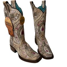 Nwt Corral Cowboy Boots. Tan / Cream Color With Dark Pink Embroidery. Small Stacked Heel. Brass Color Studded Detail. Perfect Fair Or Concert Boot. Embellished Pink Boots For Spring, Pink Embellished Boots For Spring, Spring Embellished Pink Boots, Spring Pink Embellished Boots, Pink Embroidered Round Toe Boots, Floral Cowboy Boots, Brown Western Boots, Country Vibe, Vintage Cowboy Boots