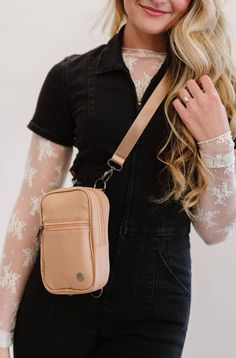 You'll feel empowered to take on whatever the day brings with the Lainey Crossbody as your companion! This multi-wear crossbody bag is convenient, cute, and sized to fit everything you need when you're on the go. The outside features two pockets ideal for your smaller essentials (think keys, lip gloss, and gum). Lainey adjusts from a crossbody, to a belt bag, to a fanny pack, and back again. Our most convertible bag yet. Perfect for adventures indoors or outdoors! The Lainey is newest trend in A Travel Crossbody, Kid Lifestyle, Pullover Cardigan, Dark Khaki, Modern Chic, Black Hardware, Tie Shoes, Phone Wallet, Mens Activewear