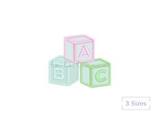 three cubes with the letters abc and c on them, all in different colors