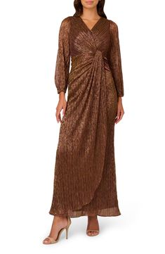 Shimmer and sparkle with every move you make in this elegant long-sleeve evening gown designed with a wrap-inspired silhouette that's gathered at the waist. 62" length Hidden back-zip closure Surplice V-neck Long sleeves Lined 60% polyester, 40% metallic fibers Spot clean Imported Draped Gown, Metallic Mesh, Long Sleeve Evening Gowns, Drape Gowns, Outfit Wedding Guest, Montana Wedding, Groom Dresses, Long Sleeve Gown, Metallic Dress