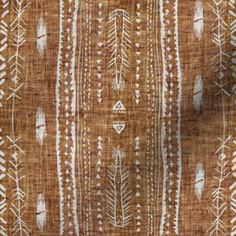 a brown and white pattern on fabric