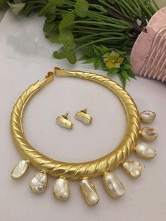 A Gift for someone most adorable for you. Earrings made of brass. Material : brass, pearl,stone. Necklace : 1 Earring:1 Necklace Indian, Pearl Stone, Indian Necklace, Jewelry Antique, Christmas Deals, Brass Material, Stone Necklace, Indian Jewelry, Charm Necklace