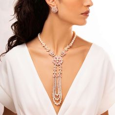 Exquisitely detailed, the Cleopatra necklace showcases a cascade of delicate 3-8.5mm Freshwater pearls. At its centre, sits a striking bejewelled flower comprised of pink sapphires, opals, diamonds and pearls in delicate pastel hues. With shimmering diamond leaves either side this necklace is a true statement piece. Complete your ensemble by pairing it with the matching earrings for a sophisticated look. Pearl Size: 3-8.5mmMetal: 18K Rose GoldApproximate Diamond Weight: 3.87ctsApproximate Opal Weight: 7.75ct Cleopatra Necklace, Rare Pearls, Pearl Jewellery, Yoko London, Pearl Necklaces, Necklace Craft, Pearl Types, Pearl Pendant Necklace, Pastel Hues