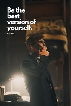 a man standing in front of a desk with his hand on his chin and the words be the best version of yourself