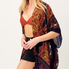 Brand New Navy Bohemian Kimono. Relaxed Fit. 100% Viscose. O/S Fits Most. Lightweight Fabrication, 3/4 Sleeves. Measurements : 46” From Shoulder To Hem. Side Slits, Open Front, No Closure. Colors: Navy, Rust, Green , Yellow And White. Price Is Firm Fitted Bohemian Blue Cover-up, Fitted Red Bohemian Kimono, Fitted Open Front Beach Kimono, Bohemian Fitted Cover-up For Beach Day, Fitted Bohemian Cover-up For Day Out, Fitted V-neck Bohemian Kimono, Casual Summer Kimono With Paisley Print, Casual Summer Paisley Print Kimono, Fitted Printed Bohemian Kimono