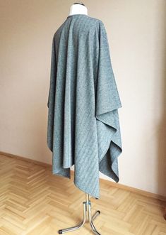 "80% Virgin wool 20% PL Size : Large Oversized Length - shoulder to hem : 100cm/ 39.4\" Width - Across back from armhole to armhole : 145cm / 57\" Care: Dry cleaning Ready to ship I ship internationally registered airmail with tracking number from Lithuania All Ruanas / wraps here https://www.etsy.com/shop/JPalKnits?ref=seller-platform-mcnav&section_id=26910076 I make all my designs in a pet-free and smoke-free environment Thank you for visiting my shop https://www.etsy.com/shop/JPalKnits Wi Oversized Wool Poncho With Long Sleeves, Ladies Poncho, Wool Poncho, Wool Shawl, May 5, Lithuania, Herringbone, Tracking Number, Shawl