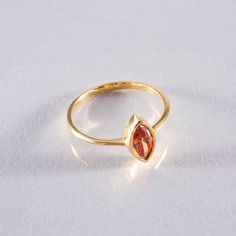 Illuminate your style with our exquisite Bezel Marquise Cut Citrine Ring, expertly crafted from high-quality 14K solid gold. This stunning piece features a vibrant marquise cut citrine gemstone, radiating warmth and brilliance. Perfect for birthdays, anniversaries, or special occasions like Christmas, this minimalist design captures the essence of elegance and sophistication. 🌟 Product Highlights Striking marquise cut citrine  Crafted from premium 14K solid gold Available in Yellow, White, or R Gold Marquise Ruby Ring For Gift, Modern Gold Ruby Ring For Gift, Modern Gold Ruby Ring As Gift, Gift Yellow Gold Topaz Ring With Bezel Setting, 14k Gold Marquise Birthstone Ring Gift, Gold Marquise Ring With Birthstone, Stackable Yellow Gold Crystal Ring As Gift, Stackable Yellow Gold Crystal Ring Gift, Gold Marquise Birthstone Ring