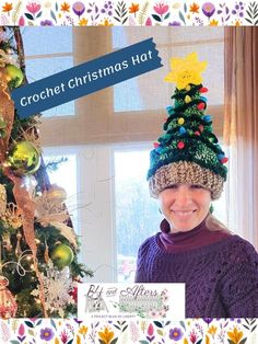 a woman wearing a crochet christmas hat in front of a decorated christmas tree