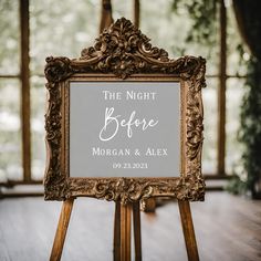 a wooden easel with a sign on it that says, the night before morgan & alex