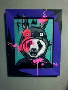 a painting of a dog wearing a helmet with paint splatters on it's face