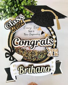 graduation decorations are hanging on the wall