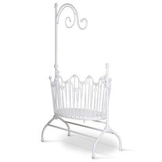 a white wrought iron magazine rack on an isolated white background with clipping for text