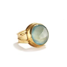 18K & 22K yellow gold, 20.66cts buff top round aquamarine As if placed on a pedestal, this low domed aquamarine will glow on your hand. • Size 8.25 (57.65mm) inside circumference • .8" (2cm) diameter of stone • Decorative square ring shank tapers down to .25" (.63cm) • Can be sized up or down 2 sizes. Cost of the re-sizing will be confirmed upon purchase • One of a kind Luxury Gold Aquamarine Rings, Gold Circle Ring, Pink Morganite Engagement Ring, Golden Rings, Amethyst Studs, Moissanite Engagement Ring Oval, Ring Shank, Ring Trends, Green Garnet