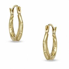 Perfect for every day wear, these child-sized hoop earrings are fashioned in warm 14K gold. The charming faceted design is polished to a bright luster. The hoops secure comfortably with hinged backs. Engagement Ring Necklace, Faceted Design, Baby Earrings, Peoples Jewellers, Local Jewelry, Rings For Girls, Men Earrings, Gold Hoops, Chain Pendants