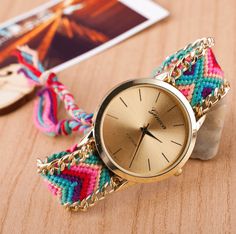 Something funky and fun in the timekeeping department! A classic gold watch case is accented with brightly colored ethnic patterns in soft handwoven threads. The band is edged in matching gold chains. A myriad of colors to choose from with an adjustable friendship knot back it will fit anyone! Due to the handmade nature, colors and patterns may vary slightly. Size: Case: 4cm (1.5 inches in diameter) Band: Adjustable Movement: Geneva Quartz Japan (Original Price $39.99) Friendship Knot, Diy Watch, Bracelet Watches Women, Diy Weaving, Classic Gold, Women's Watch, Vintage Knitting, Geneva, Quartz Watch