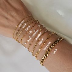 Present her with our 18K Gold Filled Dainty Chain Bracelet, a blend of elegance and simplicity. This stainless steel bracelet, featuring a delicate Figaro curb beaded chain, is perfect for women who appreciate minimalist everyday jewelry. It's a versatile and stylish gift, ideal for any occasion ✨Product Features ✨ * Stainless Steel - 18k Gold Filled  💎 Size 💎 6.5 inc+1 Extender * Antitarnish * Waterproof * Hypoallergenic * Handmade in USA 💎 Material 💎 * Stainless Steel * Our products are produced by hand in our workshops. * Our jewelry is made of handmade All the rings, bracelets, piercings, necklaces, and earrings we designed as Unique Jewelry were produced for you with modern lines to compliment your elegance. 👻 🚚 Shipping & Production Time 🏭 🎁 All of our items will be sent in a Dainty Satellite Chain Bracelet As Gift, Dainty Beaded Bracelets With Satellite Chain For Gifts, Minimalist Beaded Chain Bracelet For Gift, Dainty Beaded Chain Bracelet For Everyday, Dainty Chain Bracelets For Gifts, Dainty Chain Bracelets As Gifts, Dainty Chain Bracelet For Gift, Dainty Gold Bracelet With Beaded Chain For Gift, Everyday Chain Bracelet With Round Beads