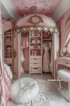 a bedroom with pink walls, white furniture and chandelier hanging from the ceiling