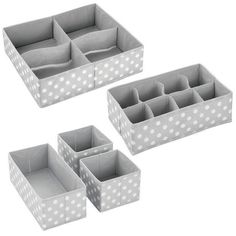 three gray and white polka dot boxes with dividers