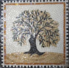 a mosaic tile tree is shown in the middle of it's frame with black and white trim