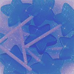 an abstract blue background with stars and shapes in the middle, including a star shaped object