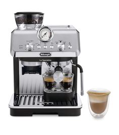 an espresso machine with two cups on it