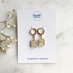 14k Babys Breath Gold Flower Huggies | Real Flower Earrings | Huggies with resin pendant | Resin Art | Dainty Jewellery | Handmade Gifts Gold Dangle Resin Flower Earrings, Gold Birth Flower Earrings For Gift, Gold Resin Earrings With Birth Flower Detail, Gold Resin Earrings With Birth Flower, Gold Flower Resin Earrings, Hypoallergenic Gold Flower Earrings With Resin, Gold Hypoallergenic Resin Flower Earrings, Hypoallergenic Gold Resin Flower Earrings, Everyday Gold Jewelry With Pressed Flowers