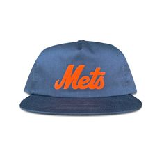 A hat so radical that Mr. Met would give it to his mama. Channel your inner Shea Stadium and scoop up this vitange inspire New York Mets snapback hat. Made from a cotton/poly fabric featuring a custom JI Creative flocked patch. Enjoy friends! * 5-panel, unstructured hat  * Snapback closure  * Custom JI Creative flocked patch * Color: Navy * Size - One Size Fits All (6 ⅝" - 7 ⅝") * Contents - 60% Cotton / 40% Polyester * Profile - 3.25" Vintage Snapback Hat With Letter Print And Curved Brim, Vintage Dad Hat With Letter Print For Baseball Season, Throwback Adjustable Trucker Baseball Cap, Retro Adjustable Baseball Cap For Baseball Season, Retro Adjustable Baseball Cap, Vintage Dad Hat With Letter Print, Vintage Snapback Hat With Letter Print, Vintage Adjustable Hat With Letter Print, Retro Baseball Dad Hat