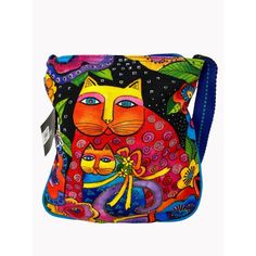 This Laurel Burch Crossbody Bag Showcases The Vibrant "Mother Daughter In Flowers" Artwork. This Multi-Colored Canvas Bag Features Bright Abstract Art, Beading, And Comes With An Original Tassel. Brand: Laurel Burch Color: Multi-Colored Style: Bright Abstract Art Adjustable Strap Beading On Front 10 Inches Wide Zippered Pocket On Back And Inside Comes With Original Tassel Features: Bright Colored Abstract Art, Adjustable Strap, Beading On Front, 10 Inches Wide, Zippered Pocket On Back And On Ins Artistic Blue Tote Shoulder Bag, Artsy Blue Bags For Everyday Use, Artistic Blue Bag For Everyday Use, Artistic Blue Shoulder Bag For Travel, Artistic Blue Shoulder Bag For Daily Use, Multicolor Artwork Bags As Gifts, Artistic Multicolor Bag With Artwork, Artistic Multicolor Bags With Artwork, Artistic Blue Gift Bag