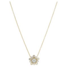 Designer: custom design Material: 14K yellow gold Diamond: 11 round brilliant cut = 0.52cttw Color: G Clarity: SI1 Dimensions: necklace measures 18-inches in length Weight: 3.22 grams Diamond Flower Necklace, Diamond Flower, Flower Necklace, Round Brilliant Cut, Round Brilliant, Diamond Jewelry, Gold Diamond, Jewelry Necklace Pendant, Jewelry Necklaces