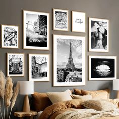 a bedroom with pictures hanging on the wall