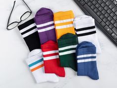 These White, Purple, Green, Blue, Red, Yellow, Black color striped cotton socks are inventive, soft and comfortable and suitable for season: Spring, Summer, Autumn and Winter. 🌿 * Comfortable, light and adaptable to any situation. * Awesome gift option: Everyone requires more socks. These adorable cotton blend socks are ideal for both gifting and favor. * Material Composition: %90 Cotton , %8 Polyamide, %2 Elastane * Features: - Cuffs with anti-pressure properties - Toe is smooth and seamless. - The socks are adult one size fits all - EU size 36-43 UK size 3-8 - Protection against ultraviolet radiation - Keeps cool * CARE Instructions: - Machine wash, inside out, with cold water (30oC) and mild detergent. - Hang to dry (recommended) or tumble dry inside out on low. Thank you for looking a Retro Socks, Sneakers Socks, School Socks, Tennis Socks, Sneakers And Socks, Socks Sneakers, Women's Socks, Men's Socks, Casual Socks