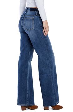 Baggy but not sloppy, these relaxed jeans have a high waist and floor-grazing hems for an elongated look, plus sustainably sourced fibers for a modern update. 32" inseam; 23 1/2" leg opening; 10 1/2" front rise; 15" back rise Zip fly with button closure Five-pocket style 66% cotton, 22% REPREVE® recycled polyester, 8% polyester, 3% rayon, 1% spandex REPREVE recycled polyester is made from 100% post-consumer recycled plastic bottles Machine wash, tumble dry Imported Relaxed Fit Wide Leg Jeans With Frayed Hem, Medium Wash High Rise Relaxed Fit Flare Jeans, Fall Medium Wash High Rise Wide Leg Pants, Fall High Rise Medium Wash Wide Leg Pants, Relaxed Fit High Rise Dark Wash Flare Jeans, High Rise Denim Blue Wide Leg Pants For Fall, Relaxed Fit Full-length Bottoms With Frayed Hem, Relaxed Fit Bottoms With Frayed Hem, Fall Medium Wash Cropped Wide Leg Pants