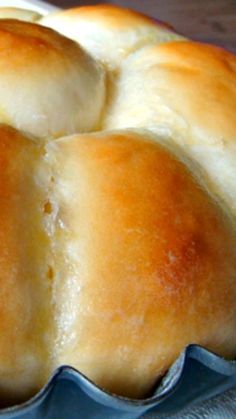 a close up of a bun in a pan on a table