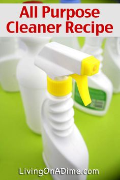 all purpose cleaner recipe on a green table with white bottles and yellow spray bottle in the background