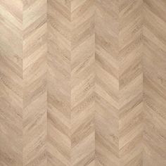 an image of wood flooring that looks like chevron herringbones in beige tones