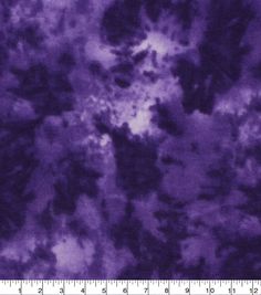 an image of the sky with clouds in purple and black colors, as well as a ruler